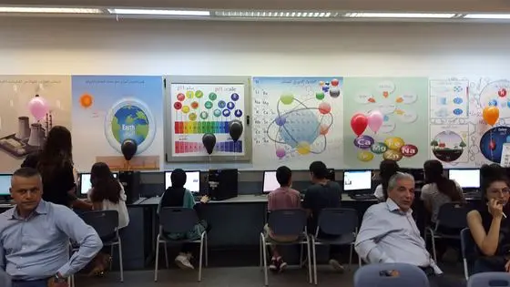 Editing workshop in a school in Tamra, with parents